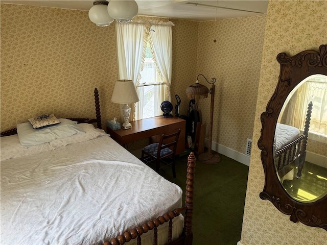 222 W Gay St, Warrensburg, MO 64093 - carpeted bedroom featuring baseboards and wallpapered walls