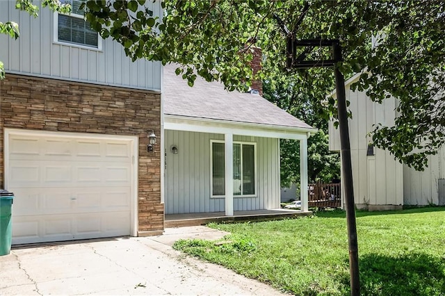 10151 W 84th St, Overland Park, KS 66212 - view of front of home featuring covered porch, board and batten siding, stone siding, and driveway