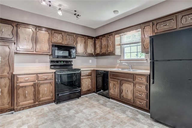 10151 W 84th St, Overland Park, KS 66212 - kitchen featuring black appliances and light countertops