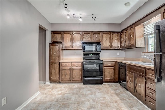 10151 W 84th St, Overland Park, KS 66212 - kitchen featuring black appliances and light countertops