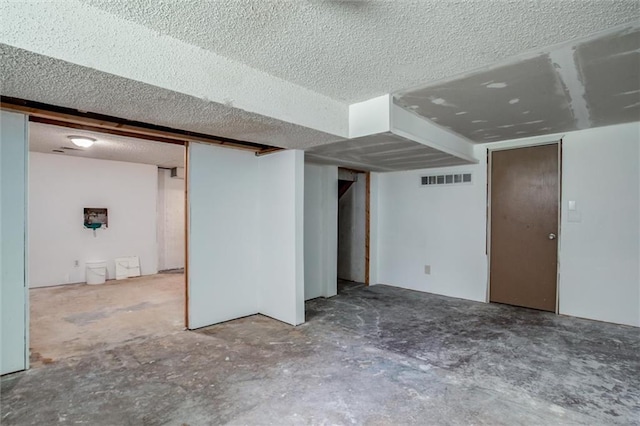 10151 W 84th St, Overland Park, KS 66212 - finished below grade area featuring a textured ceiling
