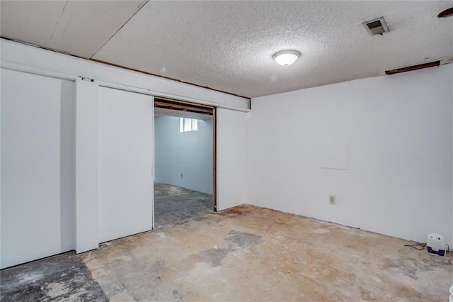 10151 W 84th St, Overland Park, KS 66212 - below grade area featuring a textured ceiling