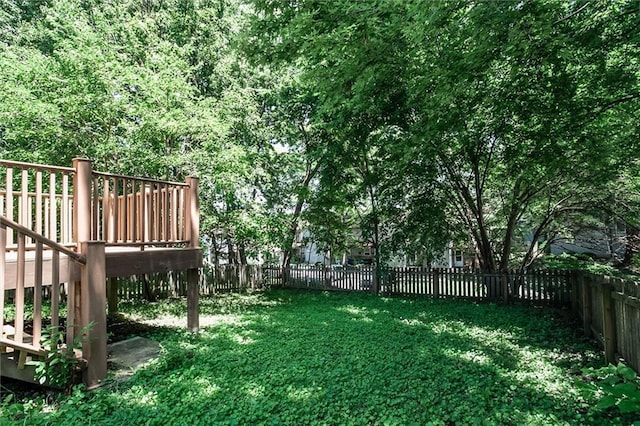10151 W 84th St, Overland Park, KS 66212 - fenced backyard with a deck and stairs