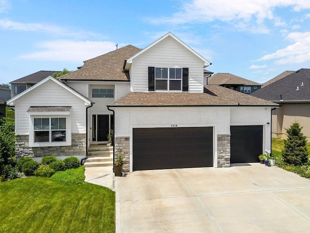 6614 Mccormick Dr, Shawnee, KS 66226 - view of front facade featuring stone siding, a shingled roof, and concrete driveway