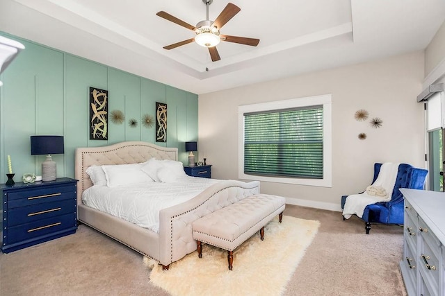 6614 Mccormick Dr, Shawnee, KS 66226 - bedroom with light colored carpet, a raised ceiling, and ceiling fan