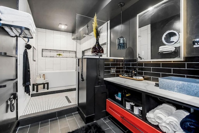 6614 Mccormick Dr, Shawnee, KS 66226 - full bathroom with tile patterned flooring, vanity, decorative backsplash, a bathtub, and a shower