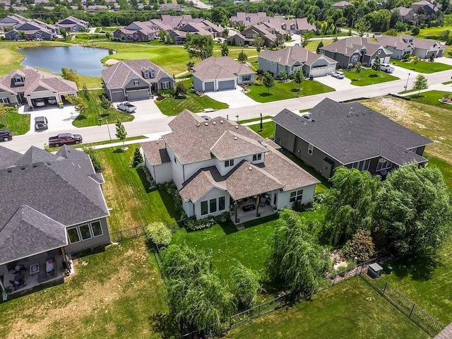 6614 Mccormick Dr, Shawnee, KS 66226 - aerial perspective of suburban area with a nearby body of water