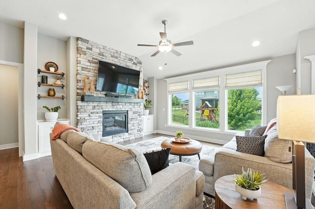 16486 S Chalet Dr, Olathe, KS 66062 - living area featuring ceiling fan, a fireplace, dark wood-type flooring, built in features, and recessed lighting