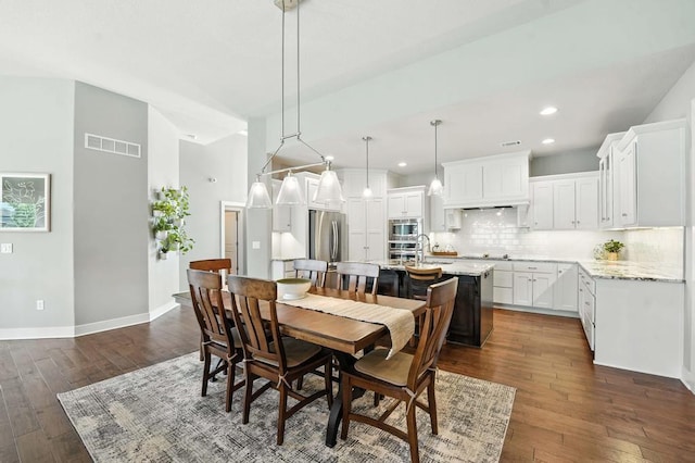 16486 S Chalet Dr, Olathe, KS 66062 - dining room featuring dark wood-style floors and recessed lighting