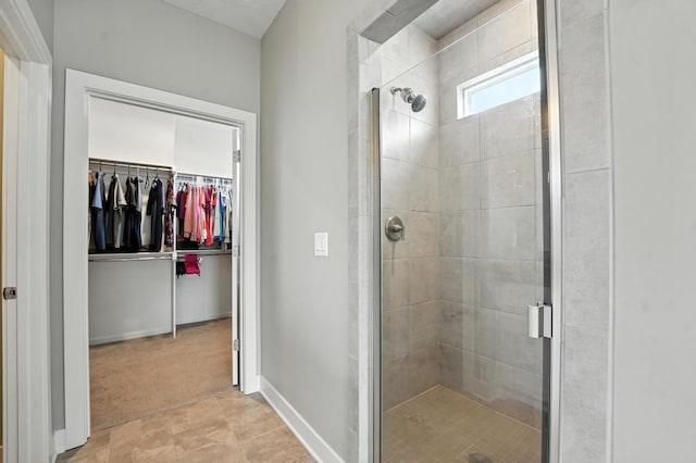 16486 S Chalet Dr, Olathe, KS 66062 - bathroom with a shower stall and a spacious closet