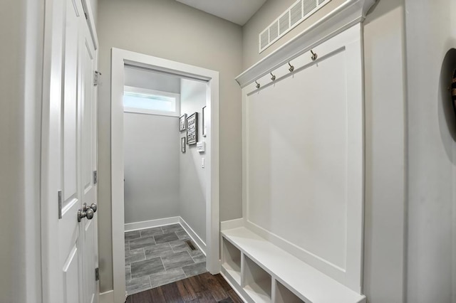 16486 S Chalet Dr, Olathe, KS 66062 - mudroom with dark wood-style flooring and baseboards
