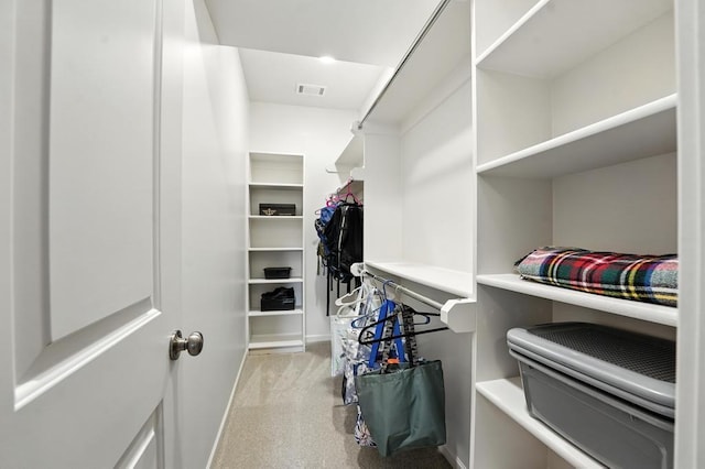 16486 S Chalet Dr, Olathe, KS 66062 - walk in closet featuring light colored carpet