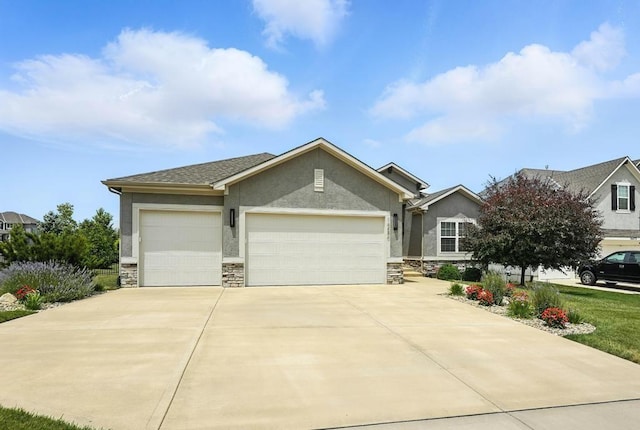 16486 S Chalet Dr, Olathe, KS 66062 - view of front facade featuring stone siding, stucco siding, a garage, and driveway