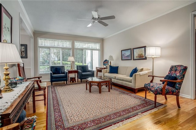 17801 E 30th St S, Independence, MO 64057 - living room featuring light wood-type flooring, ornamental molding, healthy amount of natural light, and a ceiling fan