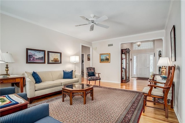 17801 E 30th St S, Independence, MO 64057 - living area with light wood-type flooring, crown molding, and a ceiling fan