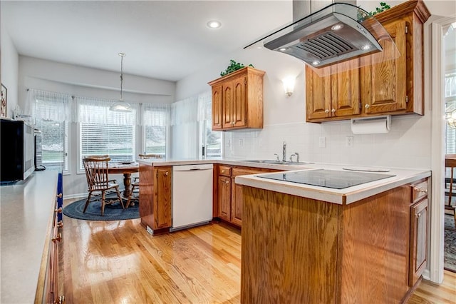 17801 E 30th St S, Independence, MO 64057 - kitchen featuring ventilation hood, dishwasher, a peninsula, black electric stovetop, and light wood-style floors