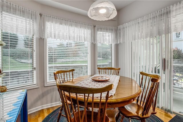 17801 E 30th St S, Independence, MO 64057 - dining room featuring wood finished floors and baseboards