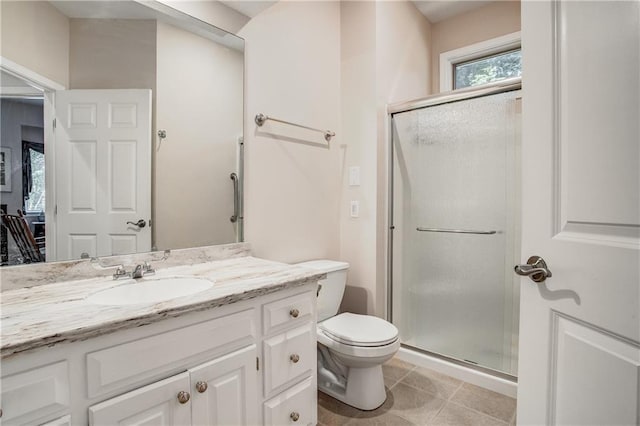 17801 E 30th St S, Independence, MO 64057 - full bathroom featuring a shower stall, vanity, and tile patterned flooring