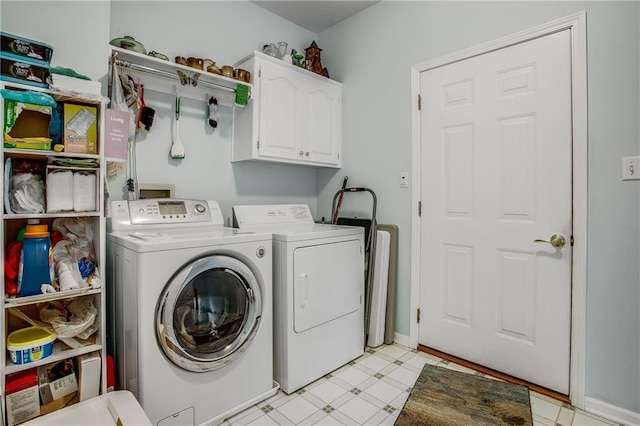 17801 E 30th St S, Independence, MO 64057 - washroom featuring cabinet space, separate washer and dryer, and light floors