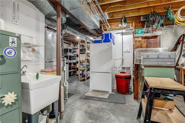 17801 E 30th St S, Independence, MO 64057 - unfinished below grade area with freestanding refrigerator and a sink