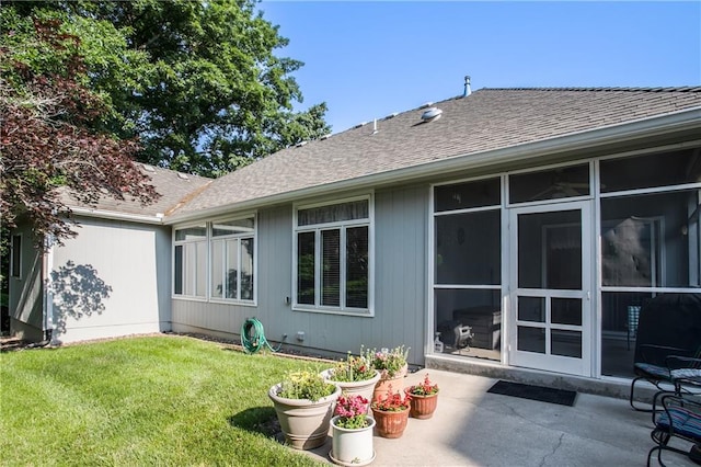 17801 E 30th St S, Independence, MO 64057 - back of property with a patio area, a yard, and a shingled roof