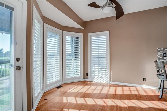 12546 Augusta Dr, Kansas City, KS 66109 - interior space with a ceiling fan and wood finished floors