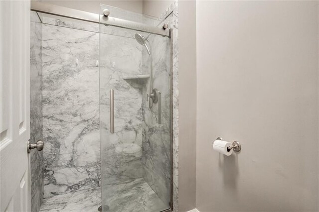 12546 Augusta Dr, Kansas City, KS 66109 - full bath featuring a marble finish shower