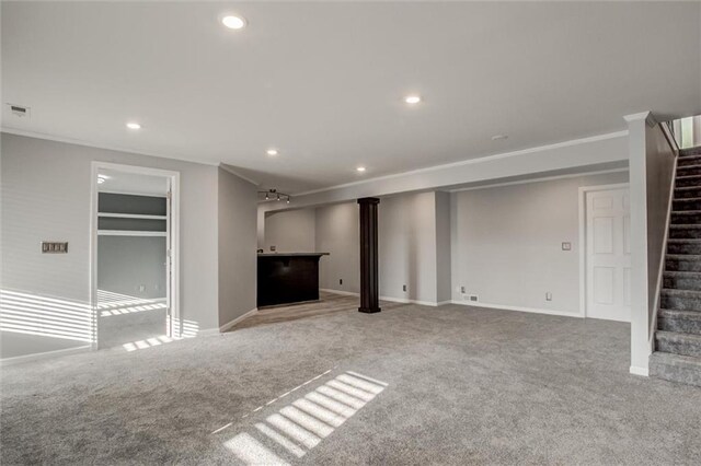 12546 Augusta Dr, Kansas City, KS 66109 - unfurnished living room featuring carpet, stairway, recessed lighting, ornamental molding, and bar area
