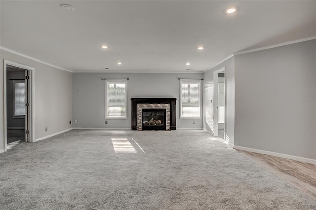 12546 Augusta Dr, Kansas City, KS 66109 - unfurnished living room with ornamental molding, carpet flooring, recessed lighting, and a fireplace
