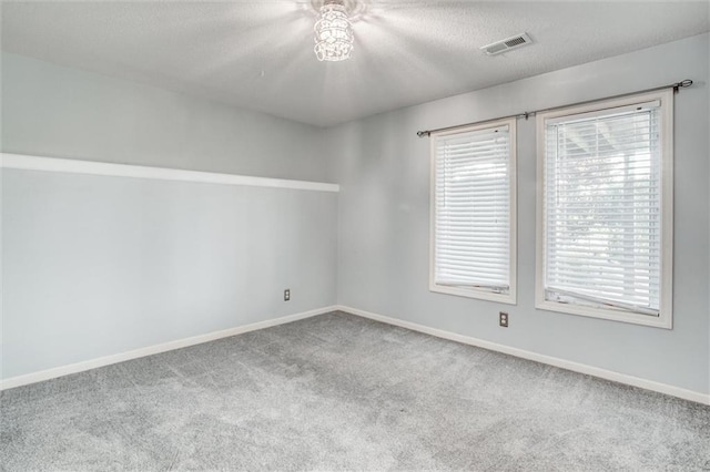 12546 Augusta Dr, Kansas City, KS 66109 - carpeted spare room with a textured ceiling and ceiling fan