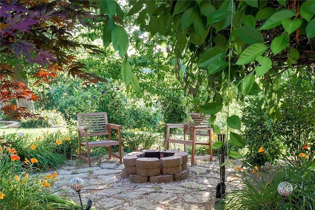 12546 Augusta Dr, Kansas City, KS 66109 - view of patio with an outdoor fire pit