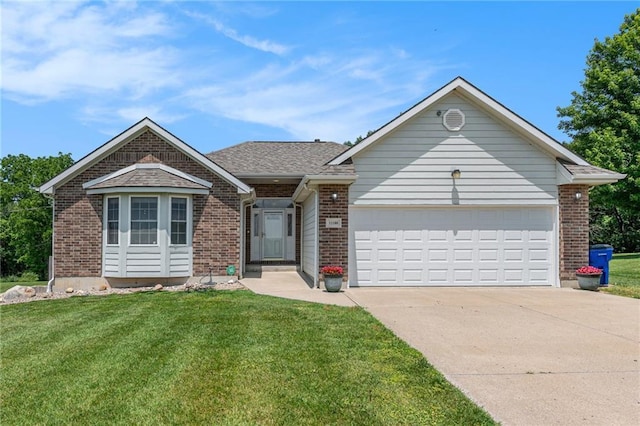 11180 Riverview Ave, Edwardsville, KS 66111 - single story home with concrete driveway, brick siding, and a front yard
