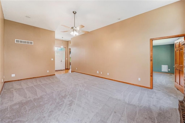 11180 Riverview Ave, Edwardsville, KS 66111 - carpeted spare room featuring ceiling fan and baseboards