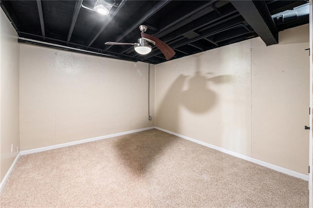 11180 Riverview Ave, Edwardsville, KS 66111 - finished basement with a ceiling fan and carpet flooring