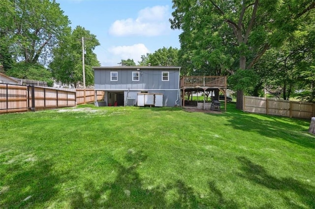 919 Walnut St, Leavenworth, KS 66048 - rear view of property featuring a fenced backyard and a deck