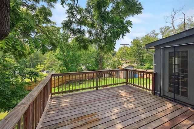 919 Walnut St, Leavenworth, KS 66048 - wooden terrace with a fenced backyard and view of wooded area