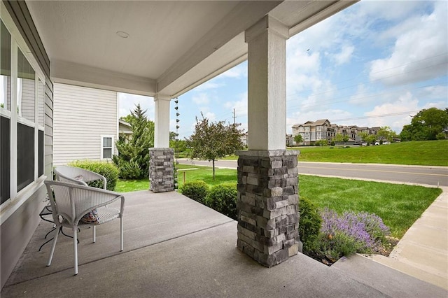 3225 SW Longview Rd, Lees Summit, MO 64081 - covered porch with a lawn