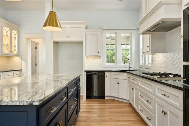 3225 SW Longview Rd, Lees Summit, MO 64081 - kitchen with appliances with stainless steel finishes, custom range hood, and white cabinetry