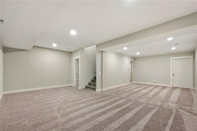 3225 SW Longview Rd, Lees Summit, MO 64081 - finished below grade area with light colored carpet, recessed lighting, and stairway