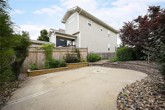 3225 SW Longview Rd, Lees Summit, MO 64081 - view of side of property with a patio area