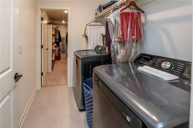 1301 NE 123rd St, Kansas City, MO 64165 - laundry room with washer and clothes dryer and light tile patterned flooring