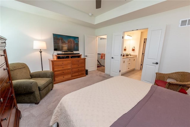1301 NE 123rd St, Kansas City, MO 64165 - bedroom featuring light colored carpet, ensuite bathroom, and a ceiling fan