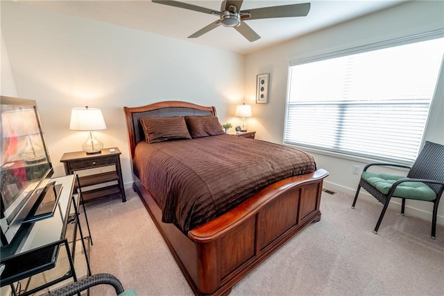 1301 NE 123rd St, Kansas City, MO 64165 - bedroom featuring light carpet and a ceiling fan
