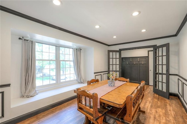1108 NW Canterbury Rd, Blue Springs, MO 64015 - dining room featuring ornamental molding, wood finished floors, recessed lighting, and french doors