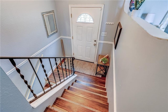 11400 Monroe Ave, Kansas City, MO 64137 - foyer entrance featuring stairway and wood finished floors