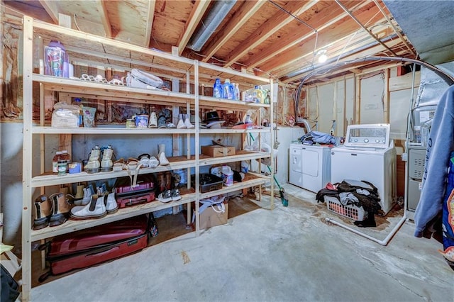 11400 Monroe Ave, Kansas City, MO 64137 - storage room featuring washing machine and dryer and heating unit