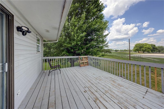 11400 Monroe Ave, Kansas City, MO 64137 - wooden deck featuring a lawn