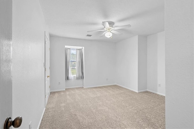 5626 NW Moonlight Meadow Ct, Lees Summit, MO 64064 - unfurnished room featuring ceiling fan, carpet, and a textured ceiling