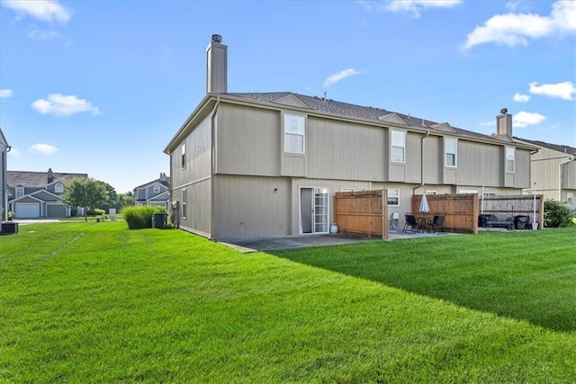 5626 NW Moonlight Meadow Ct, Lees Summit, MO 64064 - rear view of property with a patio area, a chimney, a yard, and a residential view