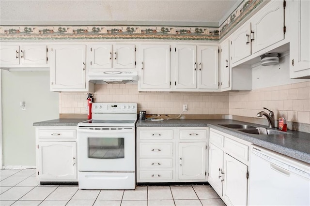 11301 Deer Haven Ln, Excelsior Springs, MO 64024 - kitchen featuring white appliances, light tile patterned floors, under cabinet range hood, and backsplash